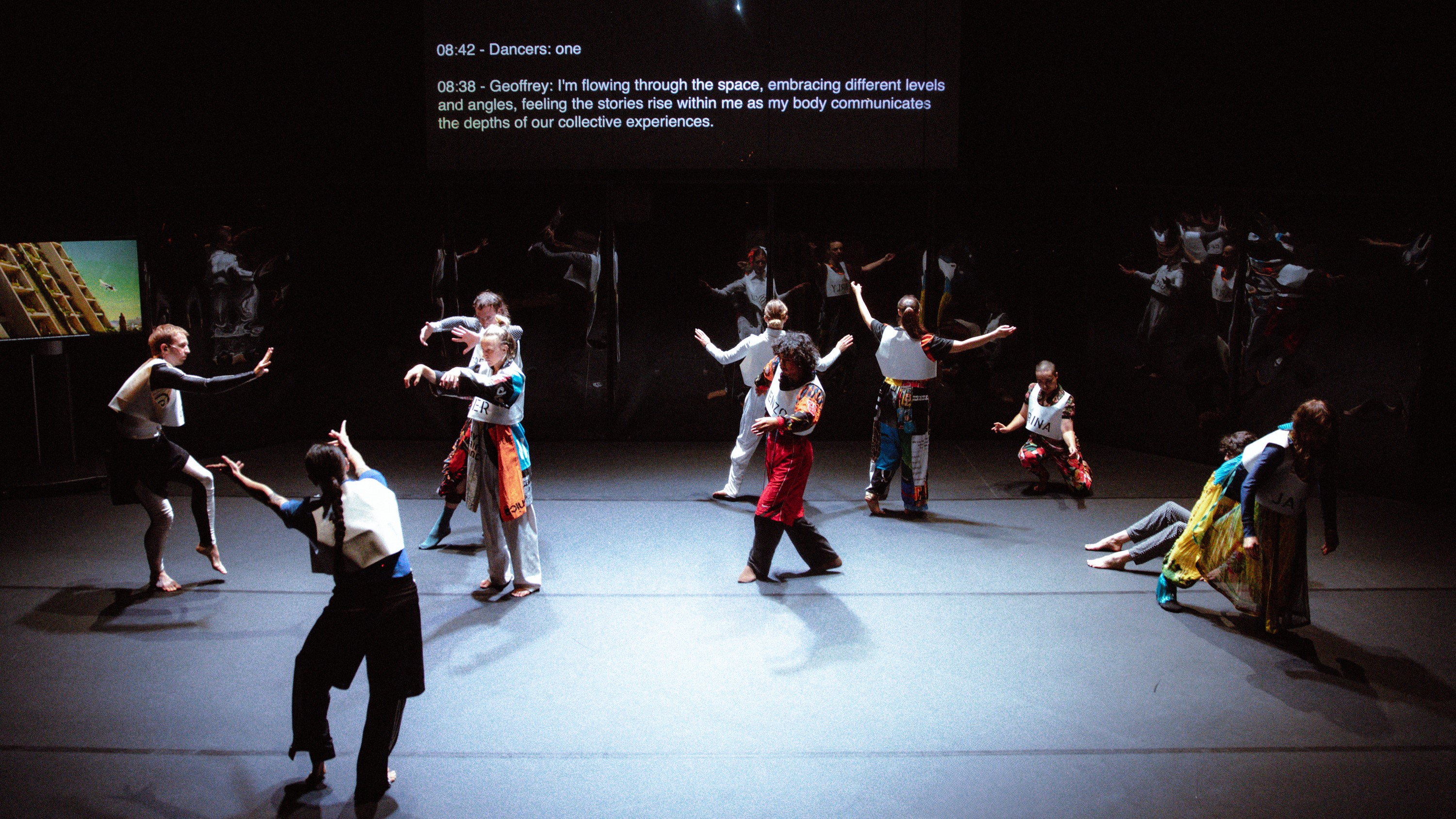 A lively dance performance featuring a group of dancers, each displaying unique movements and synchronized choreography.