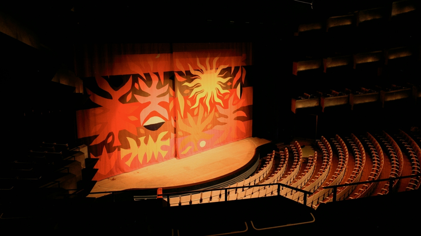 A curtain in the Concert hall with tapestry art.