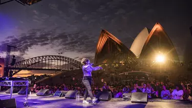 A crowd enjoying a music concert at the Forecourt.