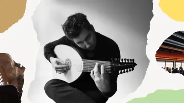 Black and white image of a man playing a lute, deeply focused.