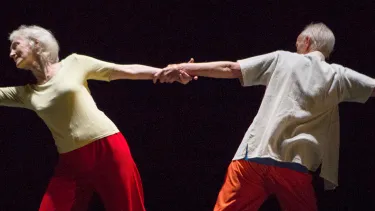 Two senior dancing together.