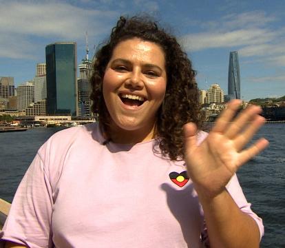 A woman in a pink top.