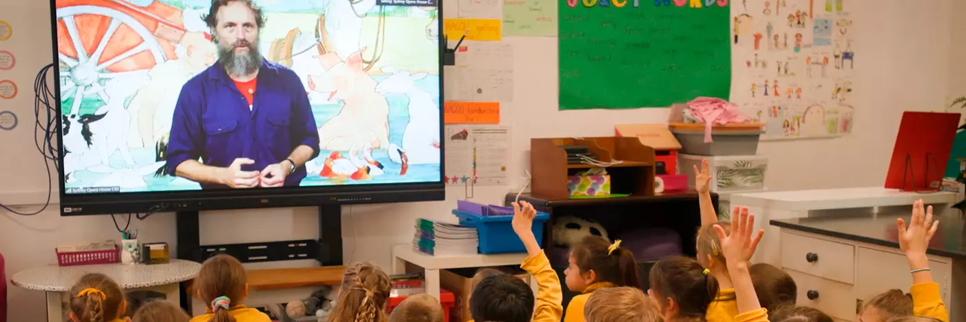 Kids learning in a digital classroom.